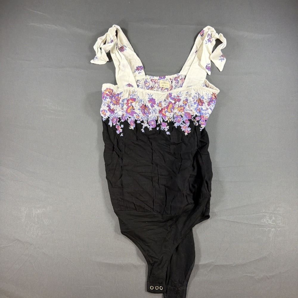 O'Neill floral tie-shoulder bodysuit featuring a purple and pink floral XS
